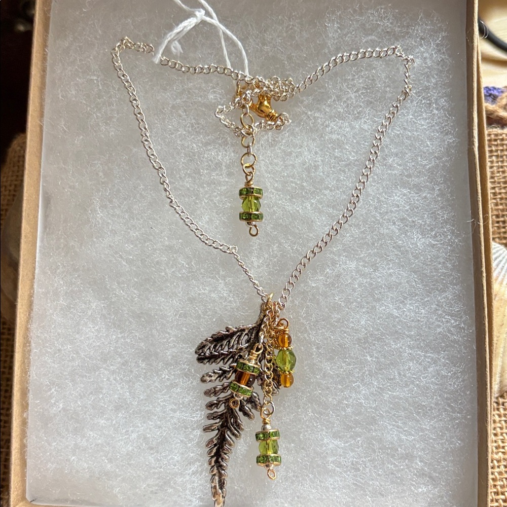 Elegant Gold and Silver Leaf Pendant Necklace